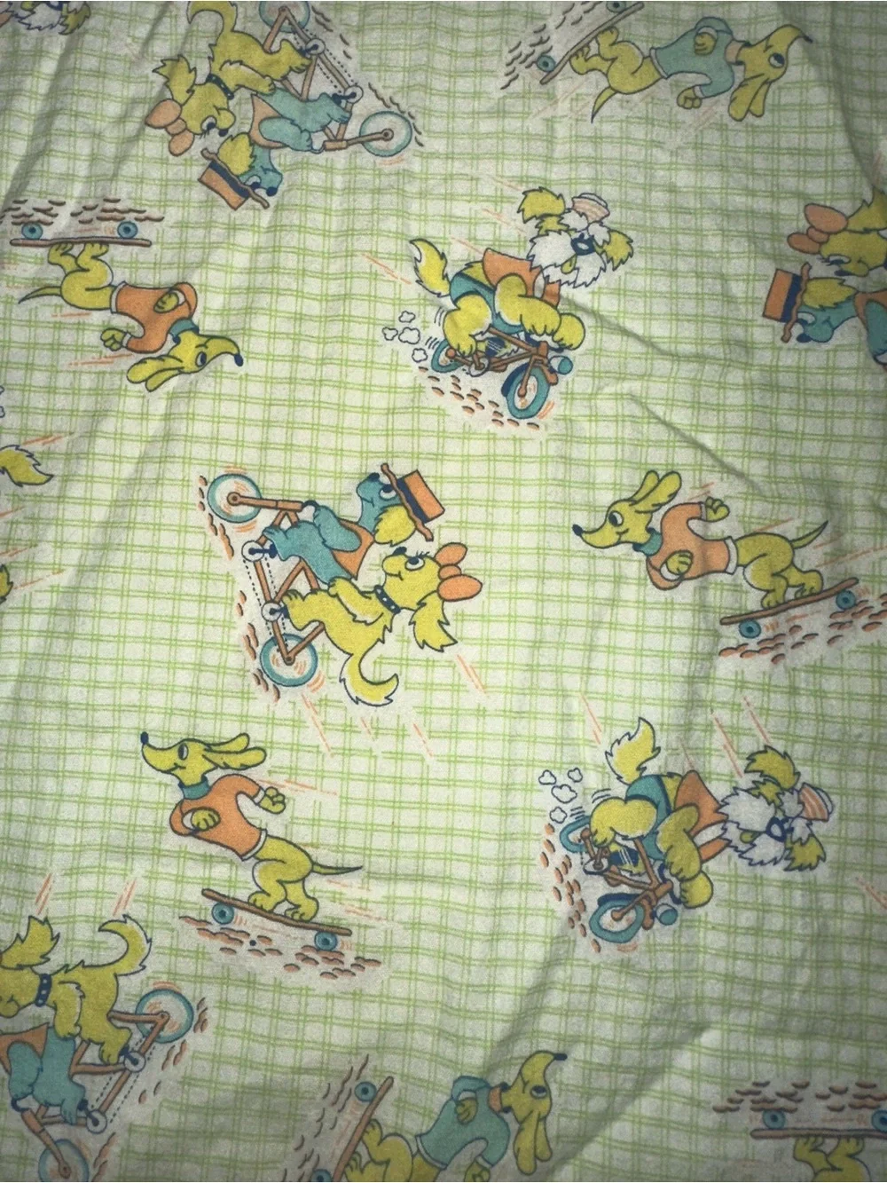 Vintage Cartoon Dog riding bikes Print Toddler/kids fitted sheet 37”x58”